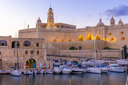 The Old Dock Buildings at Bormla Waterfront with Fort St. Michael Clock Tower in the background at d, Cospicua