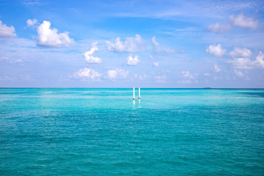 Background of turquoise sea and blue sky, The Maldives, Indian Ocean