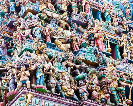 Intricate Hindu art and deity carvings on the facade of Sri Veeramakaliamman Temple in Little India, Singapore