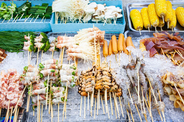Skewers of street food, seafood bbq, Thailand