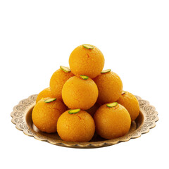 A stack of indian sweets called motichoor ladoo on a decorative golden plate isolated on a transparent background