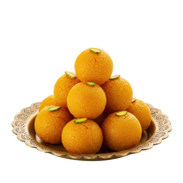 A stack of indian sweets called motichoor ladoo on a decorative golden plate isolated on a transparent background