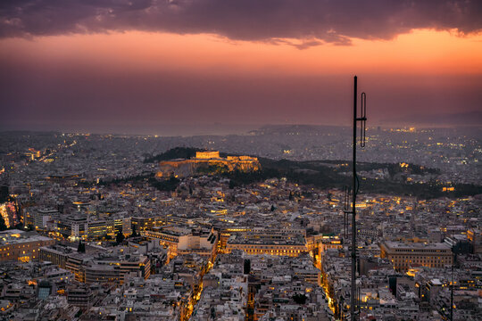 City at sunset with Parthenon and Acropolis seen from Lycabettus hill viewpoint, Athens