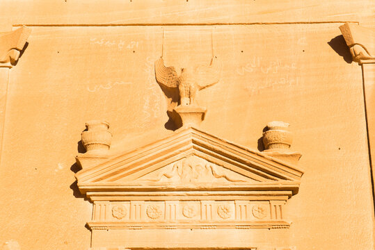 Tomb pediment carved into the sandstone rock of Jabal Banat (Qasr al-Bint) in the Site of Hegra, UNESCO, AlUla, Medina Province