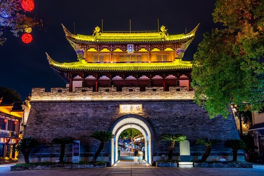 Baoning Gate, reconstructed 2004, at night, housing the drum tower in Guzicheng, ancient city of Jinhua City, Zhejiang Province