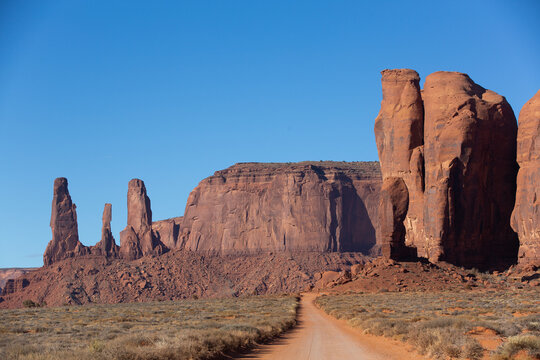 Loop Drive, Three Sisters on left, Camel Butte on right, Monument Valley Navajo Tribal Park, Utah