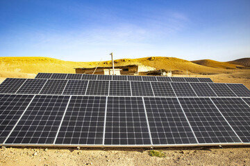 Solar panels in a desert camp in Agafay