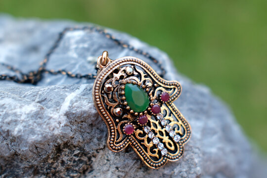 Hamsa hand (Hand of Fatima), Islamic religious symbol on a rock