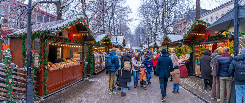 View of Christmas market during winter at dusk, Stortingsparken, Oslo, Norway