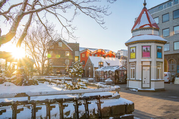 View of colourful buildings in Laejartorg public square on a sunny day in winter, Reykjavik