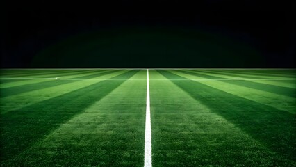 Obraz premium Green football field with clean white lines, striped grass patterns and a minimalist dark horizon, emphasizing symmetry and professionalism
