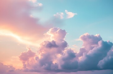 Obraz premium Pink Cumulus Clouds at Sunrise with Light Blue Sky