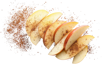 Apple slices dusted with cinnamon, a healthy and delightful autumnal snack, vibrant and inviting against a stark white background.