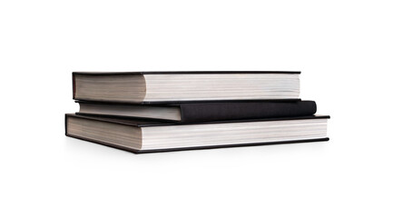An angled front on view of a pile of study books, textbooks, on a table isolated against a transparent background