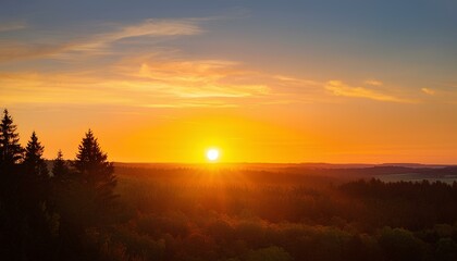 Obraz premium The golden sunset over the forest with copy space. sunset in the mountains