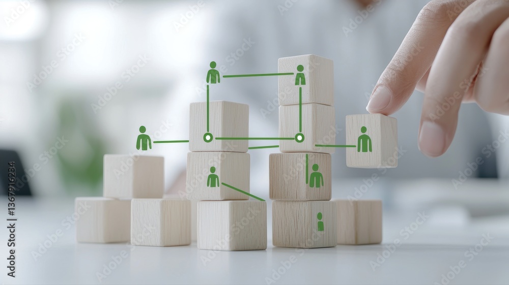 Poster hand arranging blocks symbolizing a collaborative network in a business strategy concept.