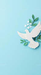 Obraz premium A white dove is perched on a blue background with green leaves