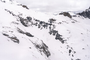 Mountain peak in winter covered with snow