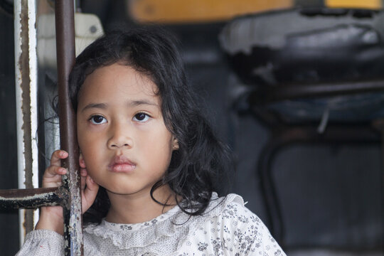 little girl with a natural cold expression