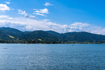Beautiful panorama view of Tegernsee lake with Bavarian alps in background on a sunny summer day, Tegernsee, Bavaria, Germany