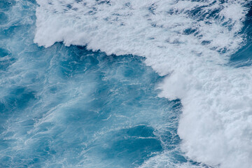 Huge crushing waves seen from above creating amazing textures. 