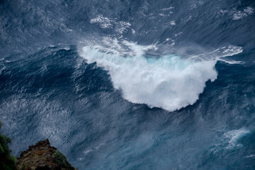 Huge crushing waves seen from above creating amazing textures.	