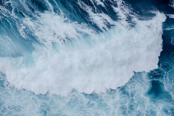 Huge crushing waves seen from above creating amazing textures. 