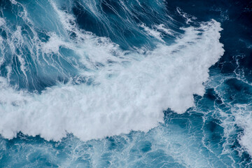 Huge crushing waves seen from above creating amazing textures. 