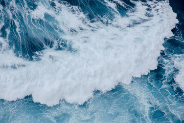Huge crushing waves seen from above creating amazing textures. 