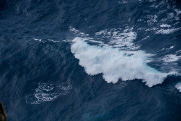 Huge crushing waves seen from above creating amazing textures. 