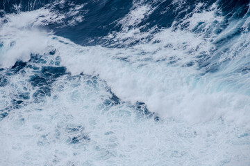 Huge crushing waves seen from above creating amazing textures. 