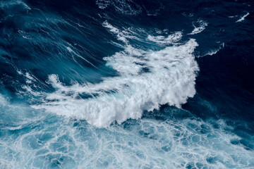 Huge crushing waves seen from above creating amazing textures. 