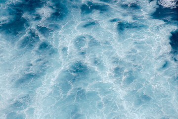 Huge crushing waves seen from above creating amazing textures.	