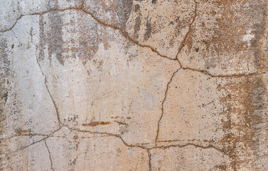 Obraz premium Texture gray cement wall with black stain and cracks