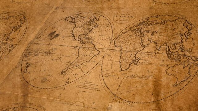 Old maps of the world repeated across brown paper background