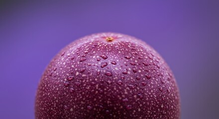 Exotic Passion Fruit Close-Up with Water Droplets on a Vibrant Purple Backdrop
