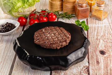 Grilled juicy beef cutlet for burger