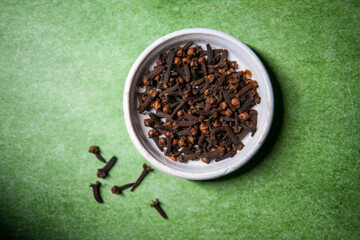 There are cloves in a pot.