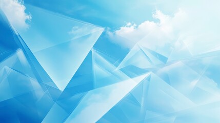 Abstract blue geometric shapes against a bright sky with clouds.