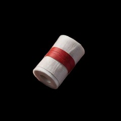 white bandage with red