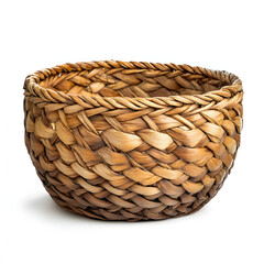 Rustic woven seagrass storage basket in shallow bowl shape against a clean white background with ample space for design or text content display purposes