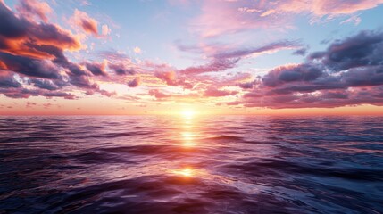 Obraz premium Breathtaking Sunrise Over Tranquil Ocean Waters with Soft Clouds and Reflective Light at Dawn