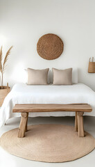 Minimalist bedroom with beige linens, wooden bench, and woven decor