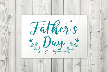 Father's day 2025-2026-A heartfelt Father's Day message in elegant teal script against a rustic white wood background.