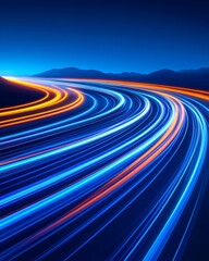 Night road, light trails curve through mountains