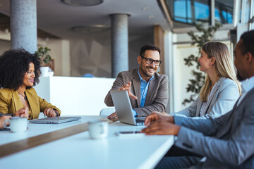 Diverse Team Discussing Ideas in a Modern Office Setting