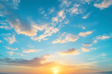 Fototapeta premium Watching the Golden Sunset with Clouds in the Bright Blue Sky