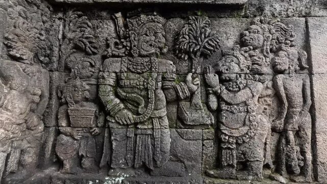 Carvings on the stone walls of Penataran temple. Penataran temple is one of the temples in Indonesia