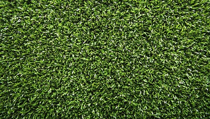 Fototapeta premium close up shot of vibrant green artificial turf creating a uniform and textured surface