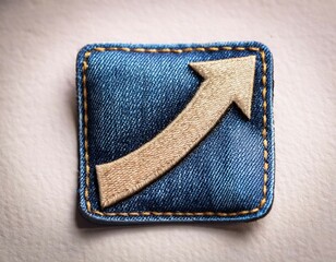 a denim patch featuring a prominent upward arrow design ideal for fashion and craft projects